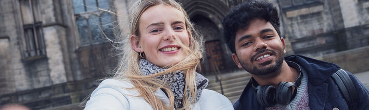 Two LONDON CITY BUSINESS COLLEGE students take a 'selfie' outside St Giles Cathedral in London