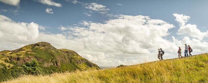 students walking up Arthur Seat